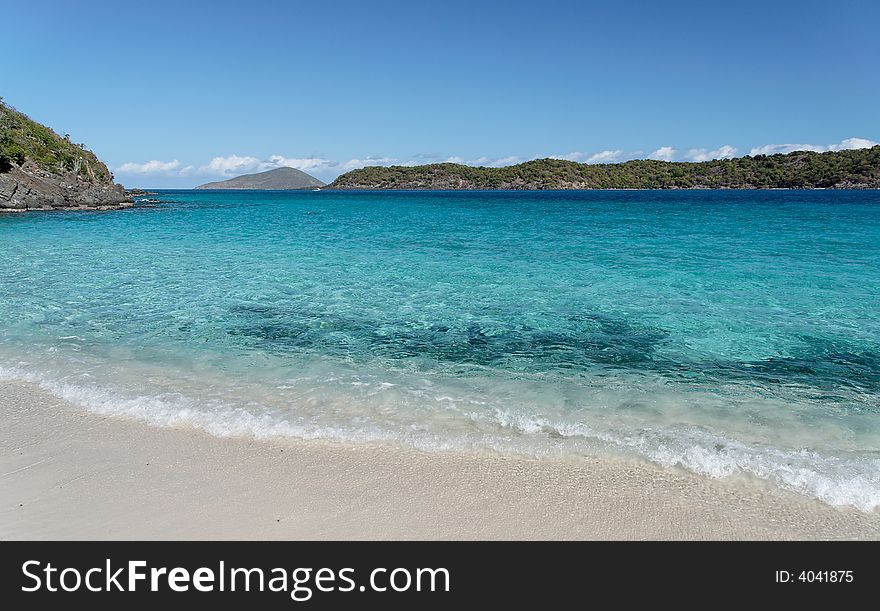 Beautiful white caribbean beach with clear blue water