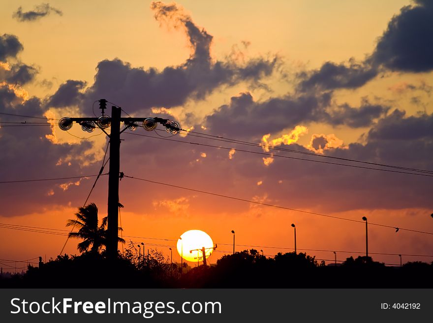 Tropical sunset sun, orange glow