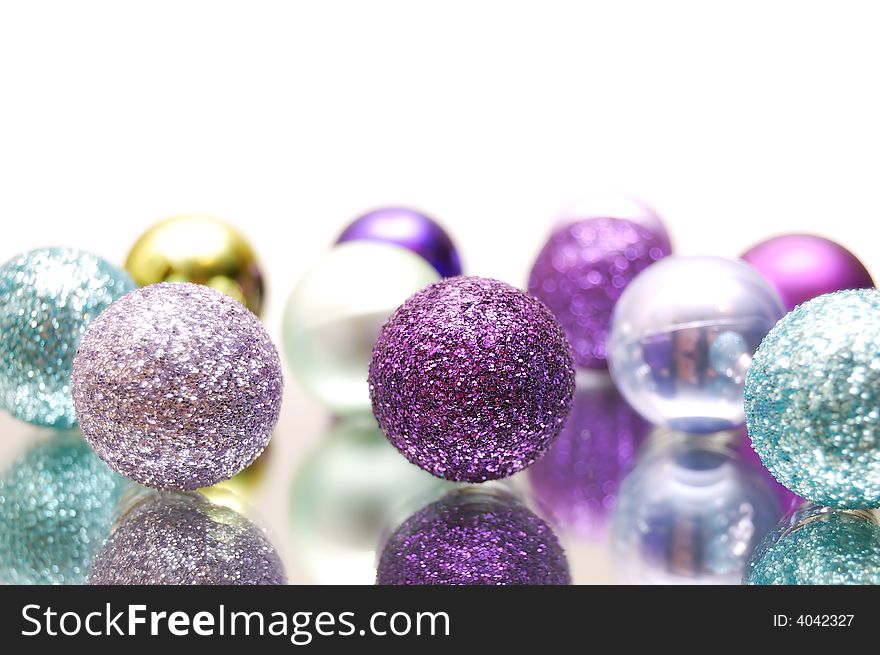 Colorful balls over a white background