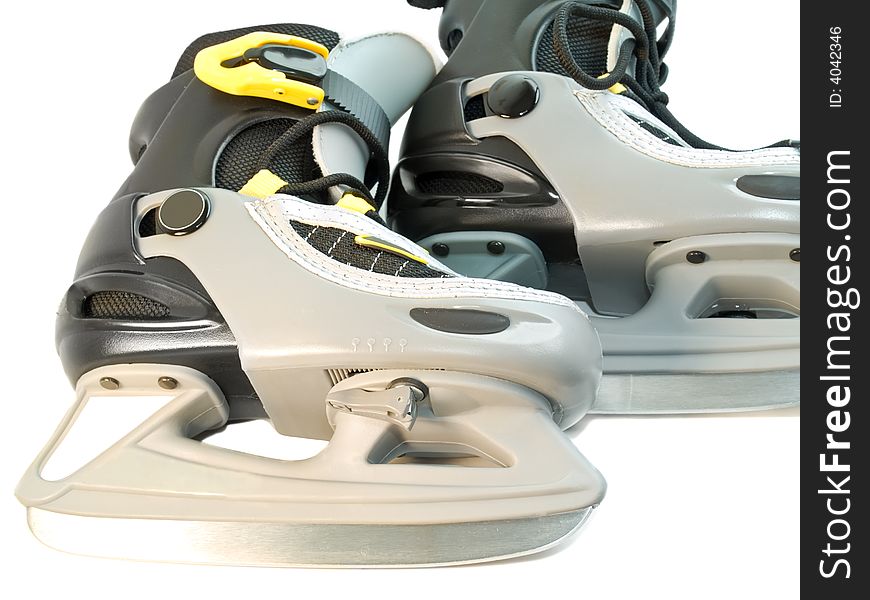 Close-up of children skates pair isolated over white. Close-up of children skates pair isolated over white