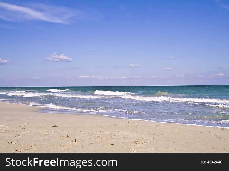 Tropical holidays blue sky, beach, waves