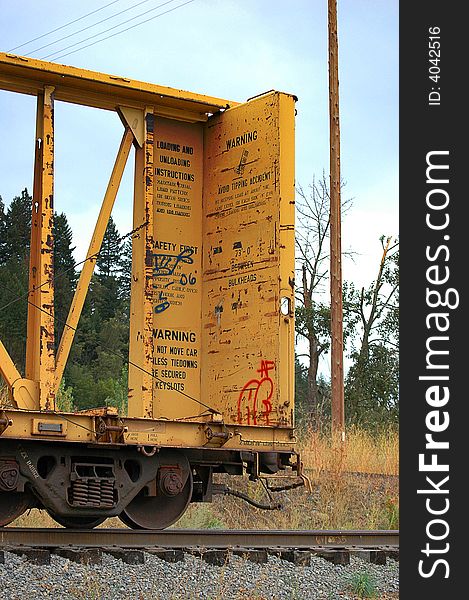 Yellow Railroad Train Car with graffiti. Yellow Railroad Train Car with graffiti