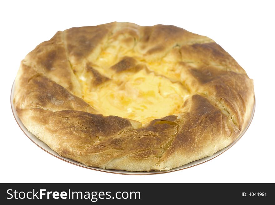 Baked pie with egg isolated on white. Baked pie with egg isolated on white