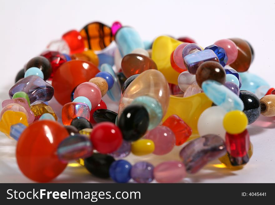 Plastic color roll up beads. Plastic color roll up beads