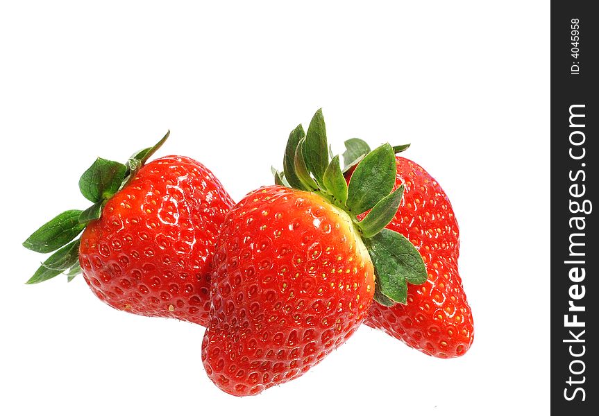 A bunch of ripe strawberries isolated on white. A bunch of ripe strawberries isolated on white