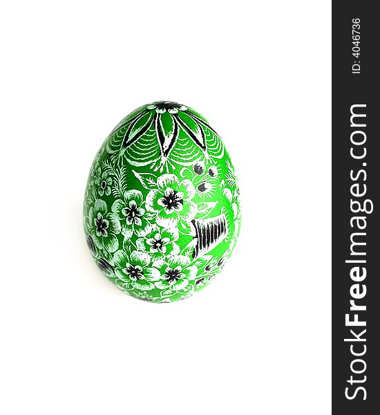 Green Easter egg on white