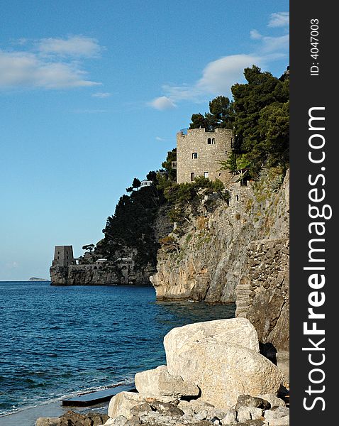 Old tower on the sea shore of Positano, Amalfitan Coast in Italy