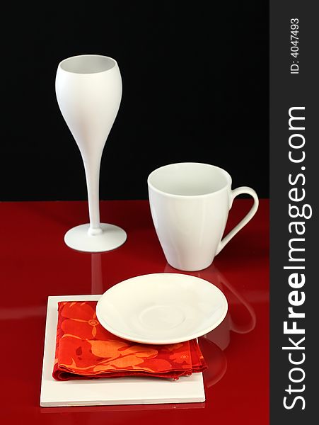 Modern dishware table design in red and white. Modern dishware table design in red and white