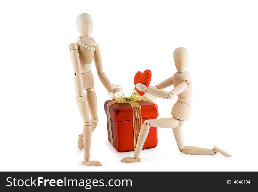 Little wooden Man offering his heart to a little wooden woman. Valentine's day card. Isolated on white background.
Clipping path included. Little wooden Man offering his heart to a little wooden woman. Valentine's day card. Isolated on white background.
Clipping path included.