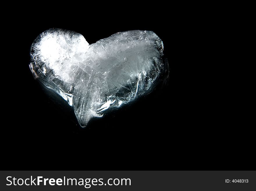 Ice heart on black background