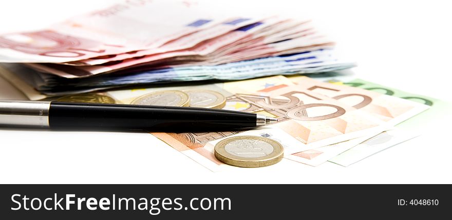 Money and pen on white background. Money and pen on white background