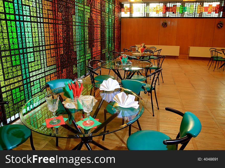 Classic small restaurant interior with setup table