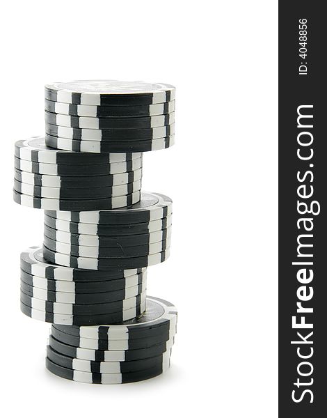 Stack of black (100 dollars) casino chips isolated over white background. Stack of black (100 dollars) casino chips isolated over white background