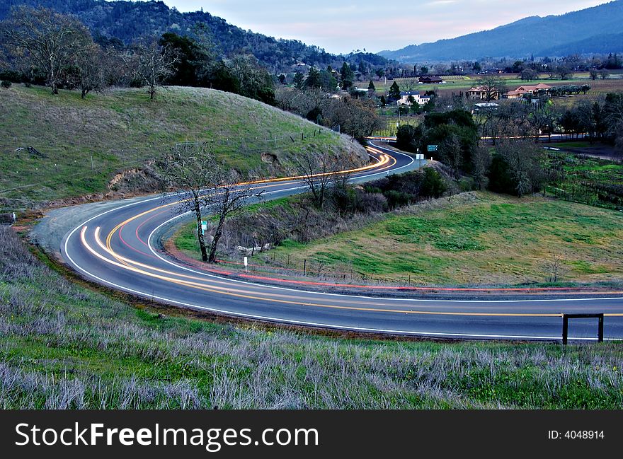 Car Light Trails On A Rural Road