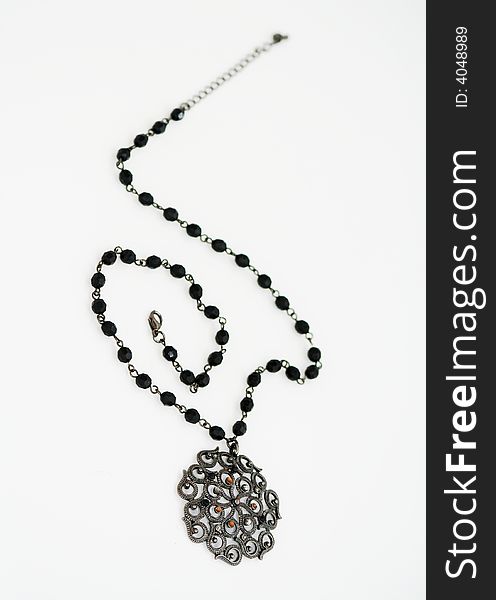 Black necklace isolated on white