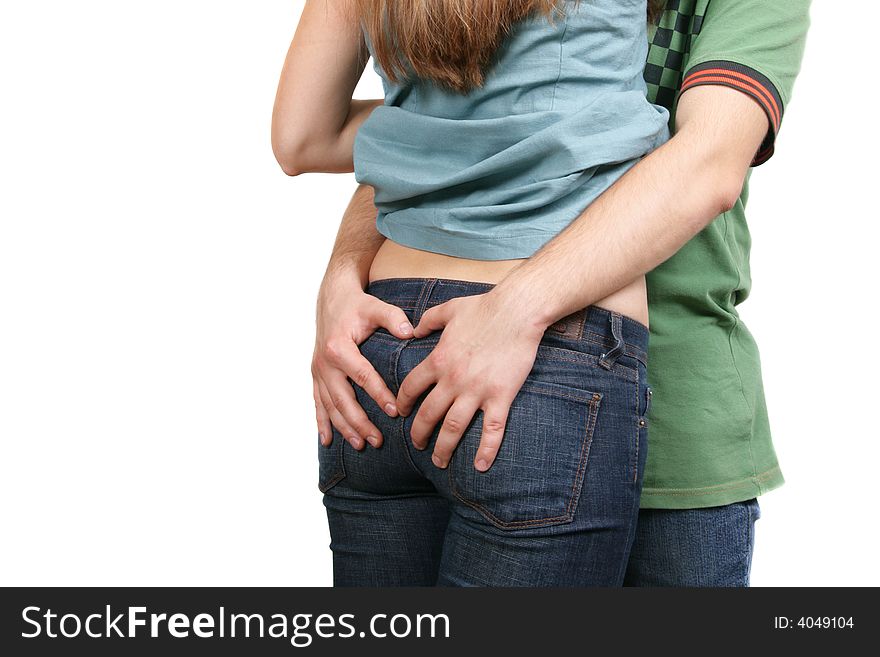 Young couple embrace isolated over white background