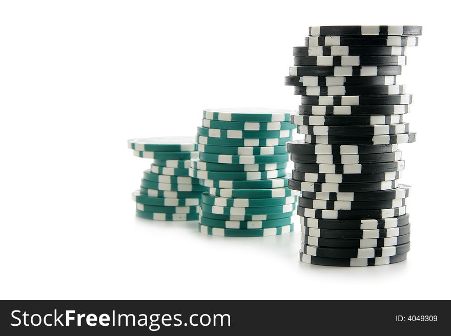 Stacks of gambling chips isolated over white background