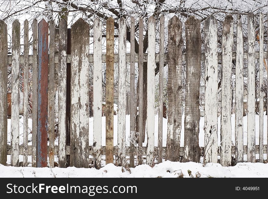 Wooden Fence At Winter