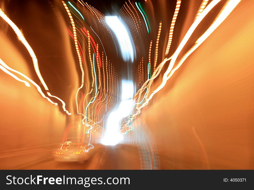 Traffic motion blue inside a tunnel in the Blue Ridge Mountains of Virginia. Traffic motion blue inside a tunnel in the Blue Ridge Mountains of Virginia.