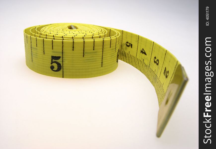 Yellow color measuring meter on  light background