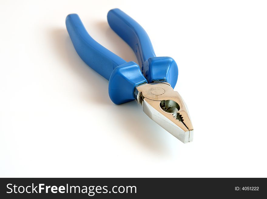 Blue pliers on white background