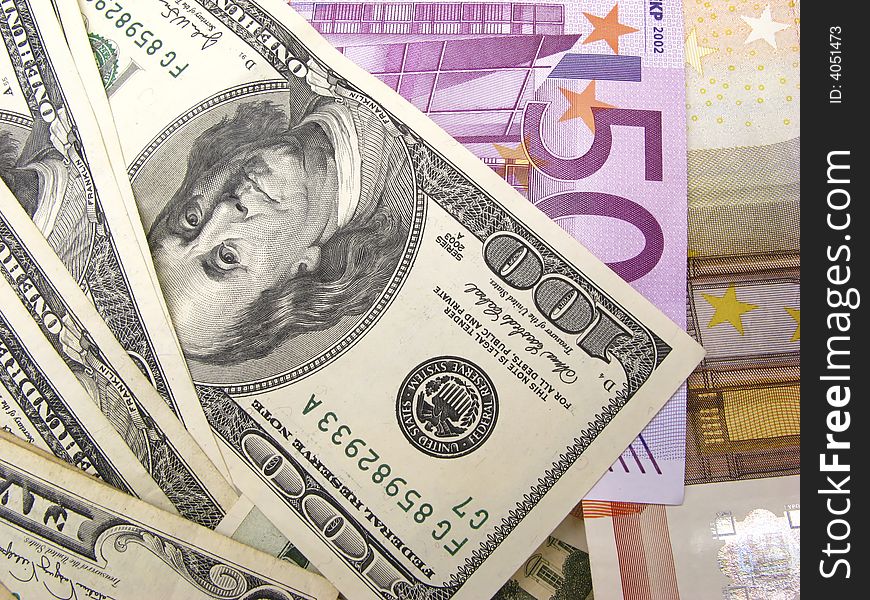 Euro and dollars paper denominations,  close up