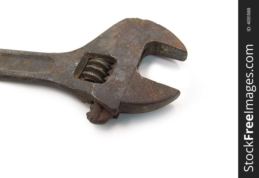 Old adjustable spanner on a white background with isolated path