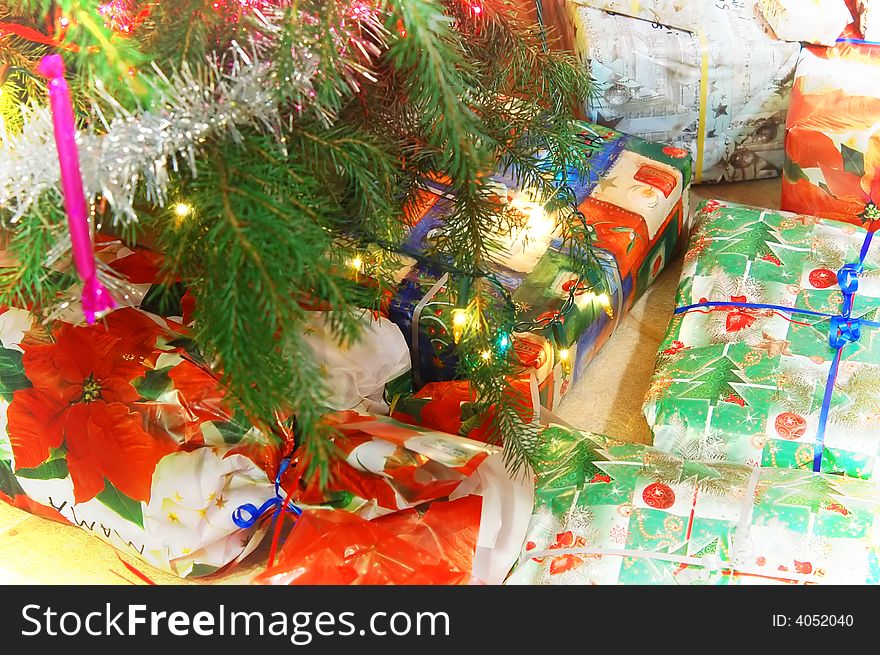 Christmas background. Christmas tree and gifts