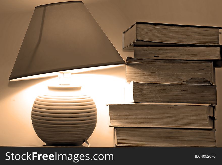 Lamp and books. Studying concept