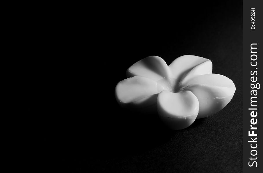 Flower shaped soap in black and white.