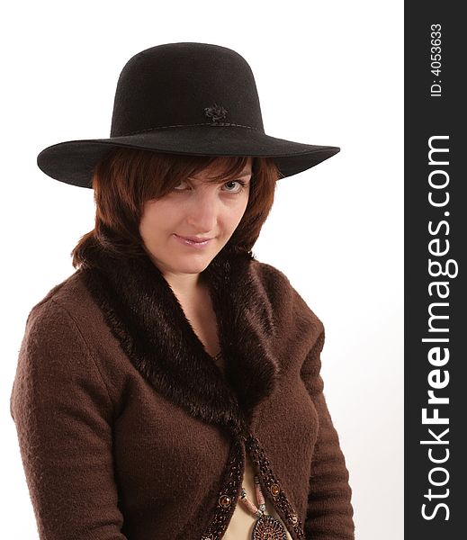 Portrait of the beautiful girl in a hat. Isolated.