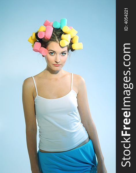 A Woman In Hair Curlers