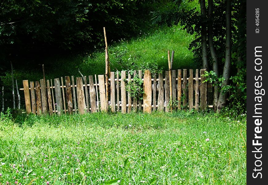 Nature with fence and grass in countryside. Nature with fence and grass in countryside