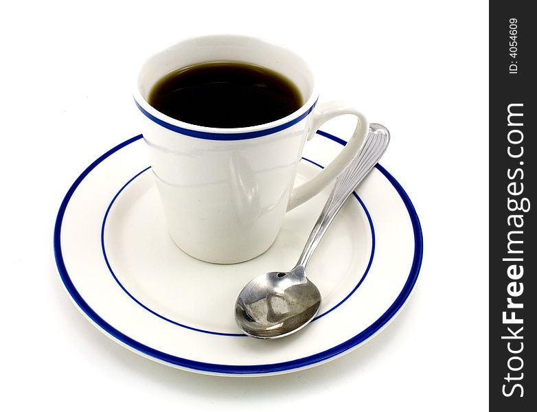 Cup of black coffee, saucer and spool isolated on white background. Cup of black coffee, saucer and spool isolated on white background.