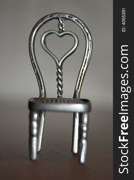 Chair made of aluminium with a beautiful heart in the middle. Chair made of aluminium with a beautiful heart in the middle