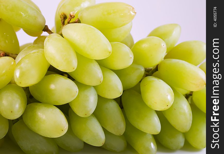 A cluster of green grapes. A cluster of green grapes