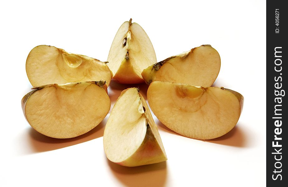 Ripe juicy apple cut into six slices. Ripe juicy apple cut into six slices