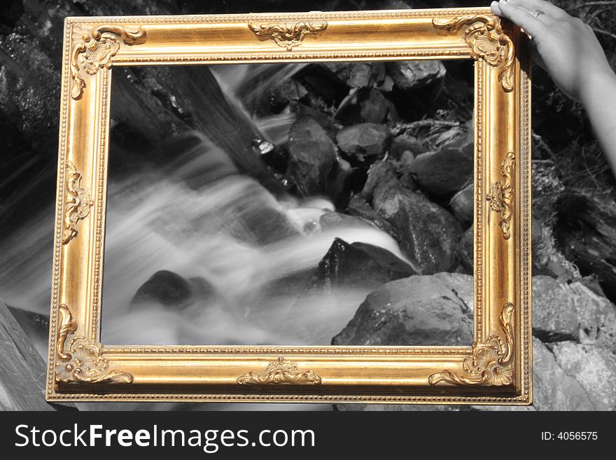 Black and white mountain spring caught in gold frame. Black and white mountain spring caught in gold frame