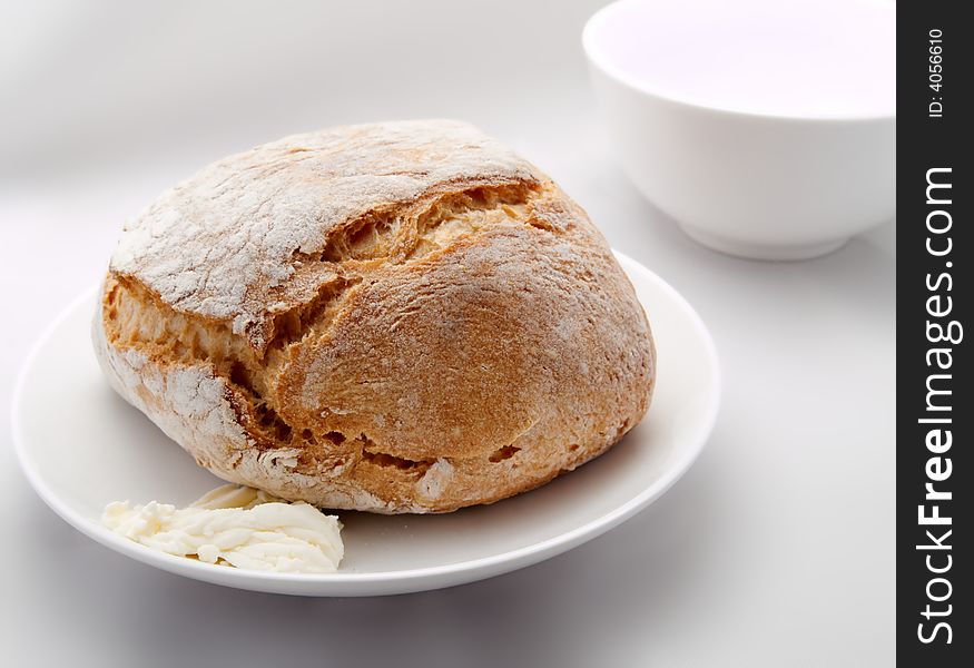 Crispy piece of traditionnal bread on a plate. Crispy piece of traditionnal bread on a plate