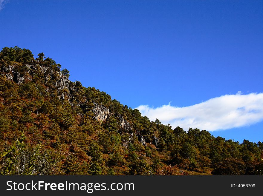 It is beautiful to there are many clouds over snow mountain in Yunnan China. It is beautiful to there are many clouds over snow mountain in Yunnan China.