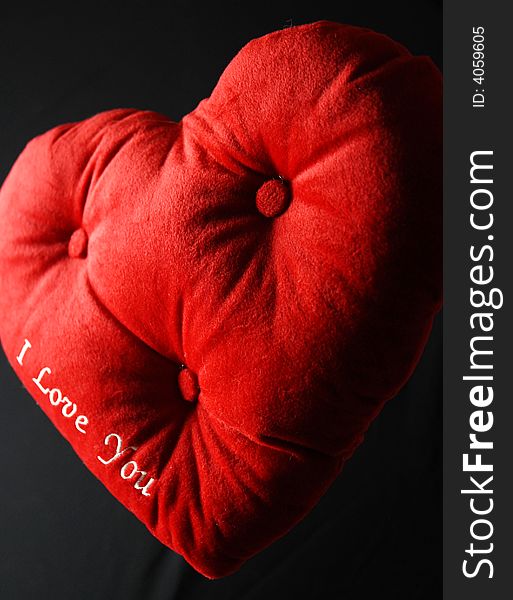 Heart shaped cushion with 'I love you'. Heart shaped cushion with 'I love you'