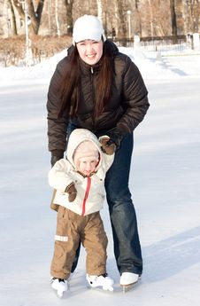 Mother And Child On The Rink Royalty Free Stock Photos Mother And Child On The Rink Royalty Free Stock Photos