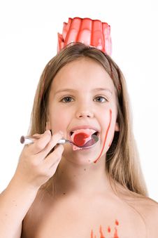 Blond Child With Desert On Her Head Eating Royalty Free Stock Image Blond Child With Desert On Her Head Eating Royalty Free Stock Image