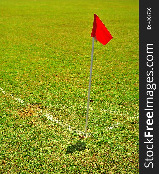 A corner flag in the game of soccer. A corner flag in the game of soccer