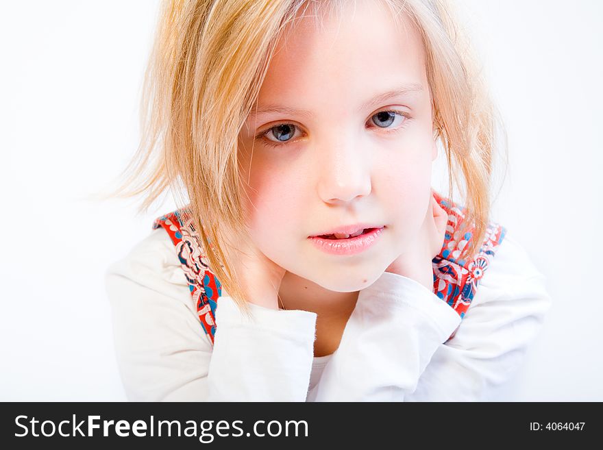 Studio portrait of a blond child