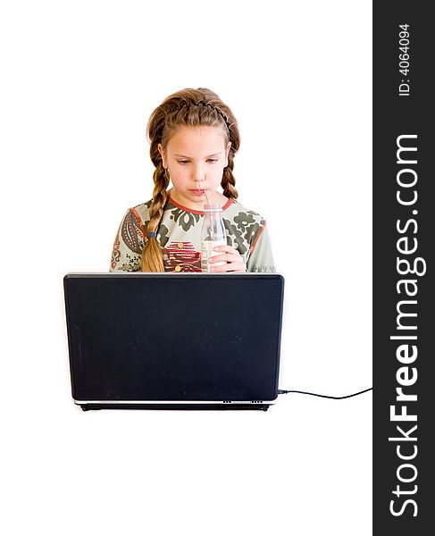 Studio portrait of a young blond child with a notebook drinking a soda. Studio portrait of a young blond child with a notebook drinking a soda