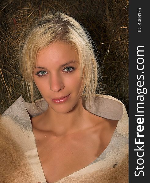 Blond lady with springbok skin around shoulders