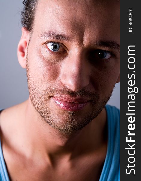 Studio portrait of a young adult man