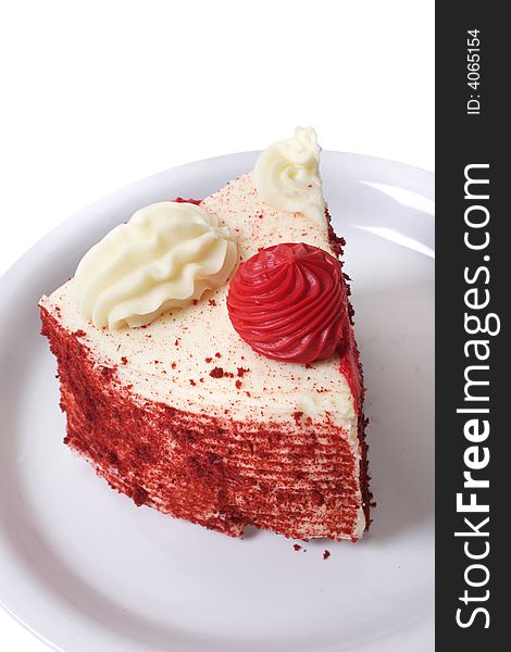 Slice of Red velvet cake on isolated white background.