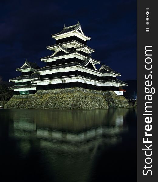 Matsumoto castle, also known as the Crow Castle, is one of the oldest (1593) original samurai-build castles in Japan, located in central Honshu as a gateway to Japanese Alps. Night picture of main keep and the two additional turrets reflecting in the water of the surrounding moat. Matsumoto castle, also known as the Crow Castle, is one of the oldest (1593) original samurai-build castles in Japan, located in central Honshu as a gateway to Japanese Alps. Night picture of main keep and the two additional turrets reflecting in the water of the surrounding moat.